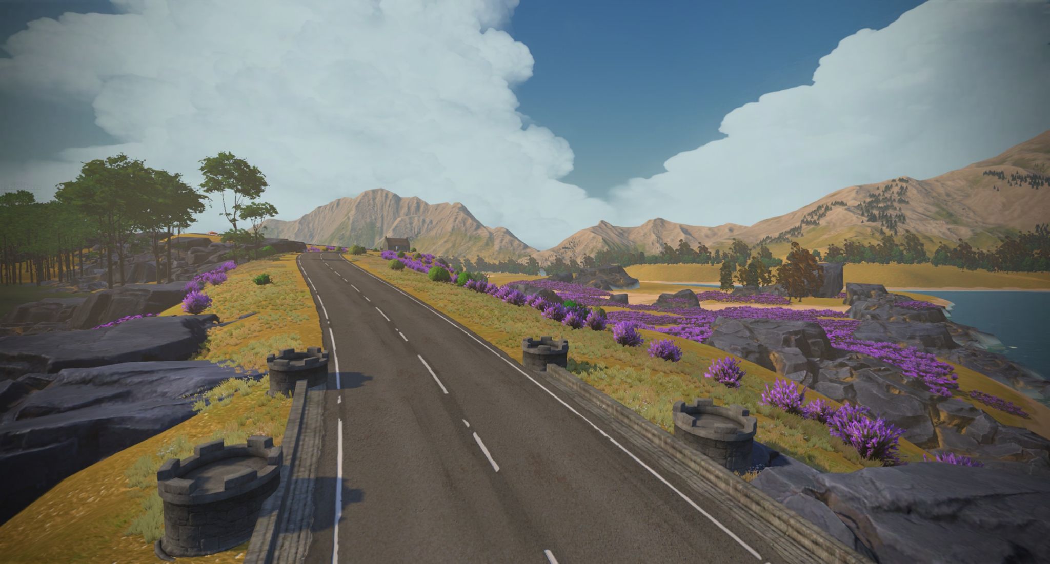 A scenic digital landscape featuring a winding road alongside a field of purple flowers. In the background, mountains rise under a partly cloudy sky, with patches of greenery and rocky formations along the roadside.