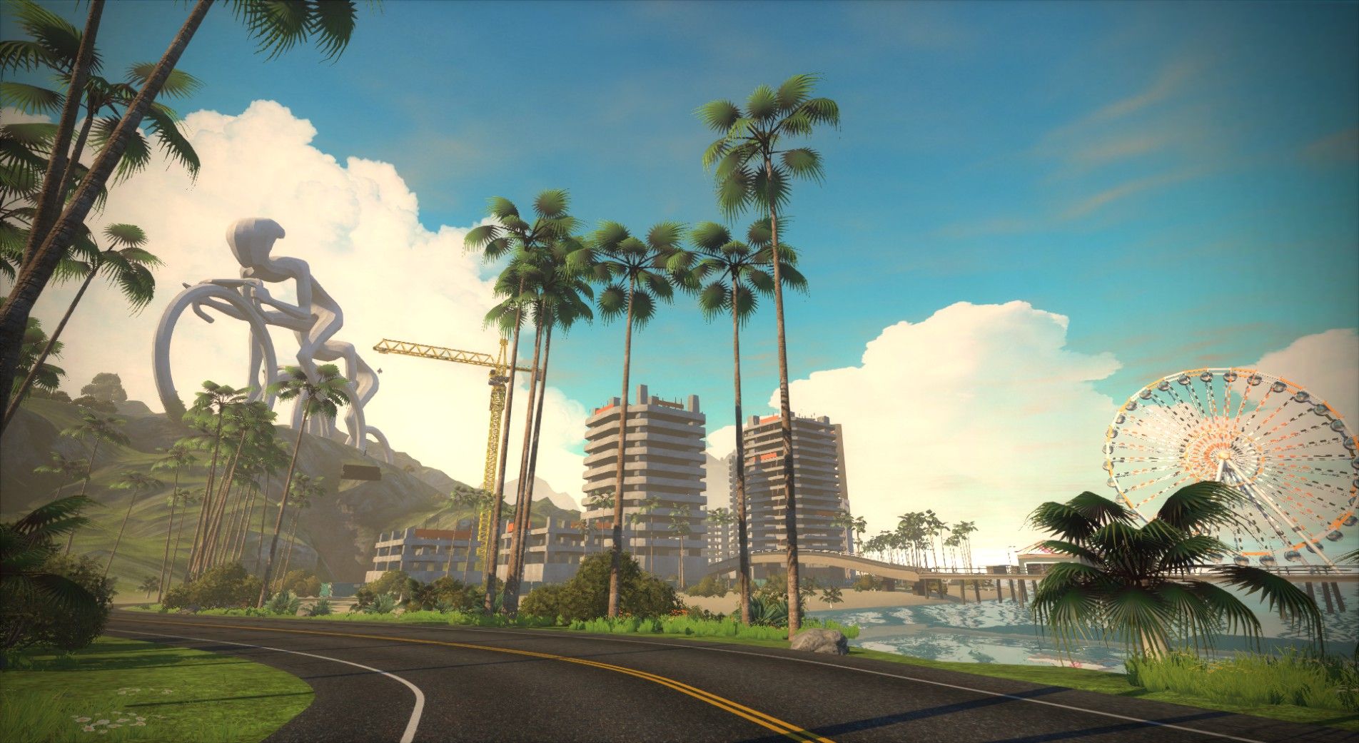 A scenic view in Zwift featuring a winding road lined with palm trees. In the background, there's a large sculpture of a cyclist, under construction buildings, and a colorful Ferris wheel beside a body of water. The sky is bright with fluffy clouds.